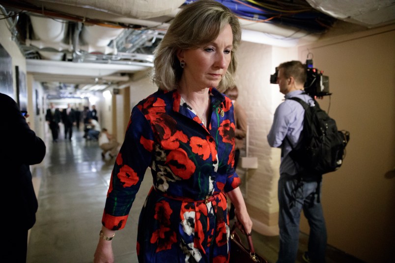 Rep. Barbara Comstock of Virginia, whose constituents live in the northern Virginia suburbs outside Washington, heads to a closed-door strategy session with Speaker of the House Paul Ryan, R-Wis., and the leadership as they try to rebuild unity within the Republican Conference, at the Capitol, in Washington, Tuesday, March 28, 2017.  Rep. Comstock is a key moderate Republican who intended to vote “no” on the Republican health care bill that was derailed last week. (AP Photo/J. Scott Applewhite)