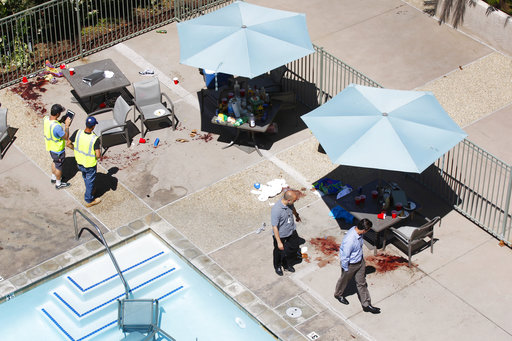 ***MANDATORY CREDIT: K.C. Alfred / San Diego Union-Tribune*** MANDATORY CREDIT***, NO SALES, NO FOREIGN, NO MAGS, NO TELEVISION, NO INTERNET***LOS ANGELES DAILY NEWS OUT, ORANGE COUNTY REGISTER OUT, INLAND VALLEY DAILY BULLETIN OUT, LA OPINION OUT.SAN DIEGO, CA - MAY 1, 2017 - Remnants of a birthday party in the pool area at the La Jolla Crossroads apartments shows the chaotic scene after a shooting took place on Sunday. Peter Selis, 49, open fired on the party at the crowded pool. Seven people were wounded. (Photo by K.C. Alfred/The San Diego Union-Tribune)