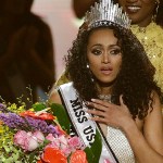 Miss District of Columbia USA Kara McCullough reacts as she is crowned the new Miss USA by former Miss USA Deshauna Barber during the Miss USA contest Sunday, May 14, 2017, in Las Vegas. (AP Photo/John Locher)
