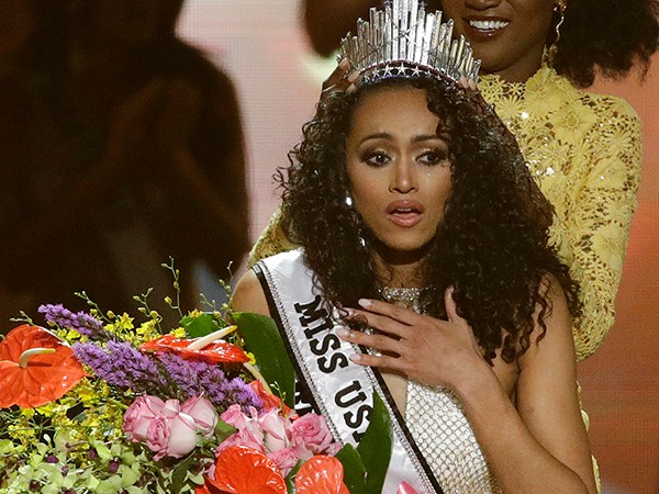 Miss District of Columbia USA Kara McCullough reacts as she is crowned the new Miss USA by former Miss USA Deshauna Barber during the Miss USA contest Sunday, May 14, 2017, in Las Vegas. (AP Photo/John Locher)