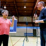 Rae Seaton, of Dubuque, Iowa, challenges U.S. Rep. Rod Blum, R-Iowa, on his answer to her healthcare question during a town hall in the Nora Gymnasium at Dubuque Senior High School in Dubuque, Iowa, on Monday, May 8, 2017.