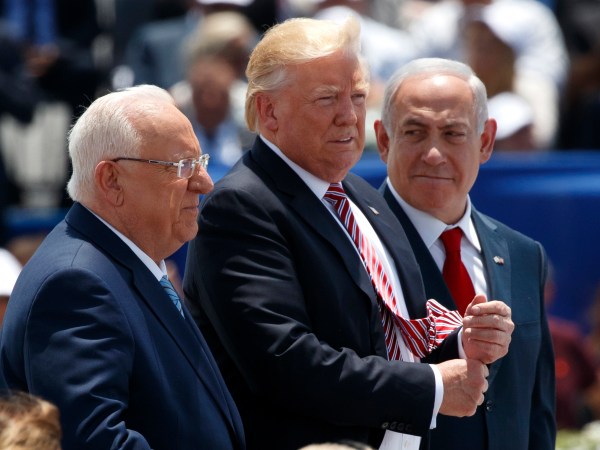 Israeli President Reuven Rivlin, President Donald Trump, and Israeli Prime Minister Benjamin Netanyahu listen during an arrival ceremony at Ben Gurion International Airport, Monday, May 22, 2017, in Tel Aviv. (AP Photo/Evan Vucci)