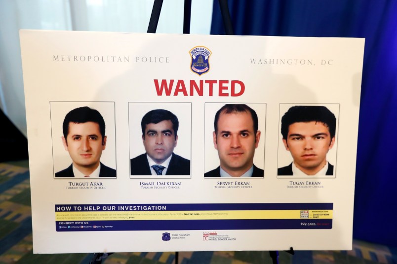 Pictures of people facing criminal charges are seen after a news conference about an altercation outside the Turkish Embassy in Washington during the visit of the Turkish President, Thursday, June 15, 2017, in Washington. Police say they've issued arrest warrants for a dozen Turkish security agents and two others accused of taking part in a violent altercation May 16 as Turkey's president visited Washington. (AP Photo/Alex Brandon)