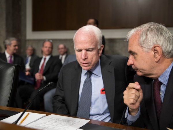 Senate Armed Services Committee Chairman John McCain, R-Ariz., left, confers with Sen. Jack Reed, D-R.I., the ranking member, at the start of a hearing at the Capitol in Washington, Tuesday, June 20, 2017.  (AP Photo/J. Scott Applewhite)