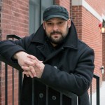 In this Jan. 9, 2017, photo, Christian Picciolini, founder of the group Life After Hate, poses for a photograph outside his Chicago home. Picciolini, a former skinhead, is an activist combatting what many see as a surge in white nationalism across the United States. He's doing it by helping members quit groups including the Ku Klux Klan and skinhead organizations. (AP Photo/Teresa Crawford)