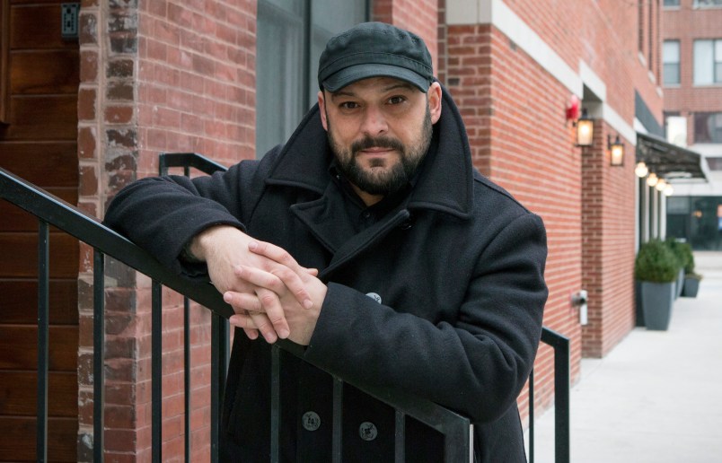 In this Jan. 9, 2017, photo, Christian Picciolini, founder of the group Life After Hate, poses for a photograph outside his Chicago home. Picciolini, a former skinhead, is an activist combatting what many see as a surge in white nationalism across the United States. He's doing it by helping members quit groups including the Ku Klux Klan and skinhead organizations. (AP Photo/Teresa Crawford)