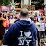 Protestors of a travel ban gather in Union Square Thursday, June 29, 2017, in New York. A scaled-back version of President Donald Trump's travel ban takes effect Thursday evening, stripped of provisions that brought protests and chaos at airports worldwide in January yet still likely to generate a new round of court fights.(AP Photo/Frank Franklin II)