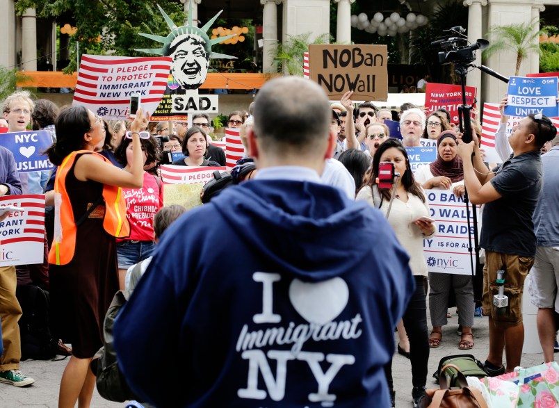 Protestors of a travel ban gather in Union Square Thursday, June 29, 2017, in New York. A scaled-back version of President Donald Trump's travel ban takes effect Thursday evening, stripped of provisions that brought protests and chaos at airports worldwide in January yet still likely to generate a new round of court fights.(AP Photo/Frank Franklin II)