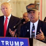 Republican presidential candidate Donald Trump listens at ;eft as Al Baldasaro, a New Hampshire state representative, speaks during a news conference in New York, Tuesday, May 31, 2016. (AP Photo/Richard Drew)