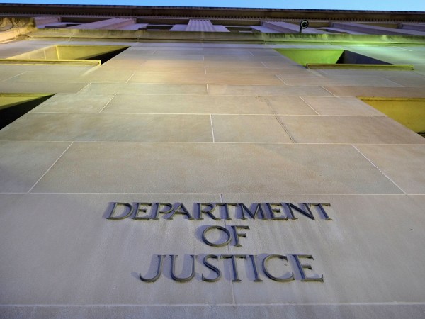 FILE - In this May 14, 2013, file photo, the Department of Justice headquarters building in Washington is photographed early in the morning. The Justice Department has signaled that it won’t try to block a lawsuit arising from the CIA’s harsh interrogation techniques, leaving the door open for a court challenge over tactics that have since been discontinued and widely discredited. (AP Photo/J. David Ake, File)