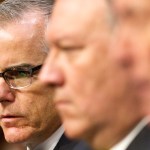 Acting FBI Director Andrew McCabe, left, next to CIA Director Mike Pompeo, listens as Director of National Intelligence Dan Coats testifies at a Senate Intelligence Committee hearing, on Capitol Hill in Washington, Thursday, May 11, 2017. It is an annual hearing about the major threats facing the U.S., but former FBI Director Jim Comey's sudden firing is certain to be a focus of questions. (AP Photo/Jacquelyn Martin)
