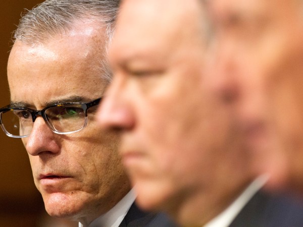 Acting FBI Director Andrew McCabe, left, next to CIA Director Mike Pompeo, listens as Director of National Intelligence Dan Coats testifies at a Senate Intelligence Committee hearing, on Capitol Hill in Washington, Thursday, May 11, 2017. It is an annual hearing about the major threats facing the U.S., but former FBI Director Jim Comey's sudden firing is certain to be a focus of questions. (AP Photo/Jacquelyn Martin)