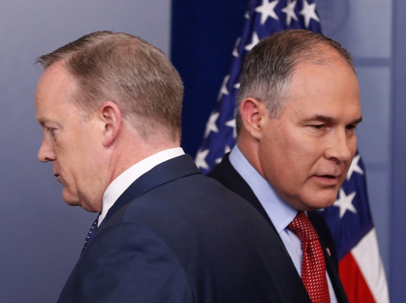 White House Press secretary Sean Spicer, left, introduces EPA Administrator Scott Pruitt, right, during the daily briefing in the Brady Press Briefing Room of the White House, Friday, June 2, 2017. (AP Photo/Pablo Martinez Monsivais)