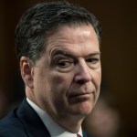 Fired FBI director James Comey recounts a series of conversations with President Donald Trump as he testifies before the Senate Select Committee on Intelligence, on Capitol Hill in Washington, Thursday, June 8, 2017. Comey alleges Trump repeatedly pressed him for his "loyalty" and directly pushed him to "lift the cloud" of investigation by declaring publicly the president was not the target of the probe into his campaign's Russia ties.   (AP Photo/J. Scott Applewhite)