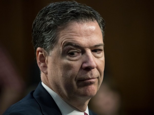 Fired FBI director James Comey recounts a series of conversations with President Donald Trump as he testifies before the Senate Select Committee on Intelligence, on Capitol Hill in Washington, Thursday, June 8, 2017. Comey alleges Trump repeatedly pressed him for his "loyalty" and directly pushed him to "lift the cloud" of investigation by declaring publicly the president was not the target of the probe into his campaign's Russia ties.   (AP Photo/J. Scott Applewhite)