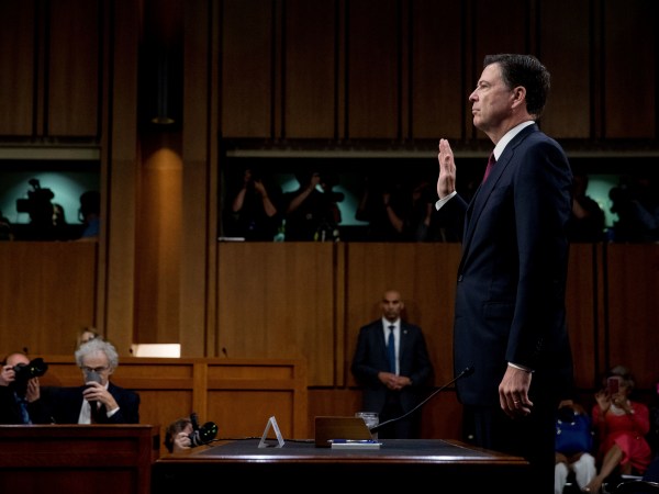 Former FBI Director James Comey is sworn in during a Senate Intelligence Committee hearing on Capitol Hill, Thursday, June 8, 2017, in Washington. (AP Photo/Andrew Harnik)