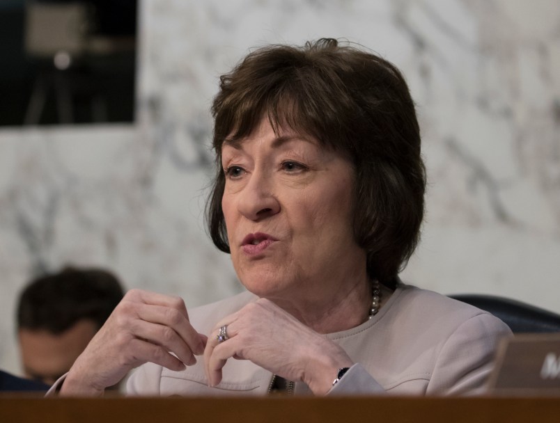 Sen. Susan Collins, R-Maine, listens as fired FBI director James Comey recounts a series of conversations with President Donald Trump as he testifies before the Senate Select Committee on Intelligence, on Capitol Hill in Washington, Thursday, June 8, 2017. Comey alleges Trump repeatedly pressed him for his "loyalty" and directly pushed him to "lift the cloud" of investigation by declaring publicly the president was not the target of the probe into his campaign's Russia ties.   (AP Photo/J. Scott Applewhite)