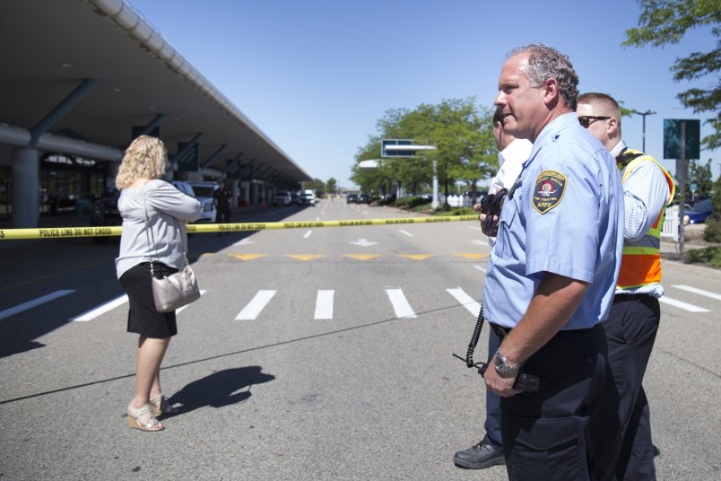 Police block travelers and traffic from entering the Flint Bishop International Airport on Thursday, June 8, 2017 as the airport was evacuated and police investigated a suspicious bag. Shannon Millard | MLive.com
