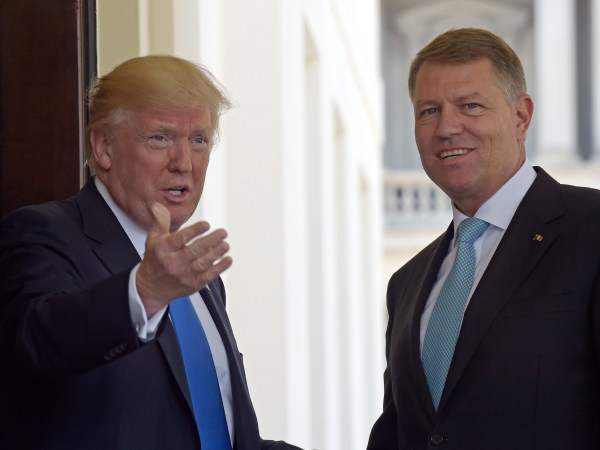 President Donald Trump welcomes Romania's President Klaus Werner Iohannis to the White House in Washington, Friday, June 9, 2017. (AP Photo/Susan Walsh)