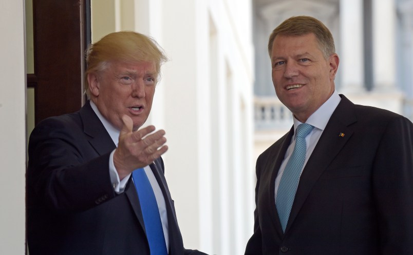 President Donald Trump welcomes Romania's President Klaus Werner Iohannis to the White House in Washington, Friday, June 9, 2017. (AP Photo/Susan Walsh)