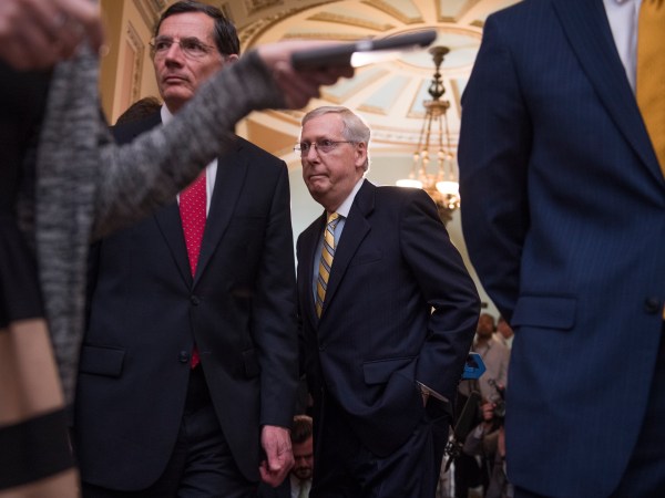 UNITED STATES - JUNE 13: Senate Majority Leader Mitch McConnell, R-Ky., center, and Sen. John Barrasso, R-Wyo., conclude a news conference after the Senate Policy luncheons in the Captiol on June 13, 2017. (Photo By Tom Williams/CQ Roll Call)
