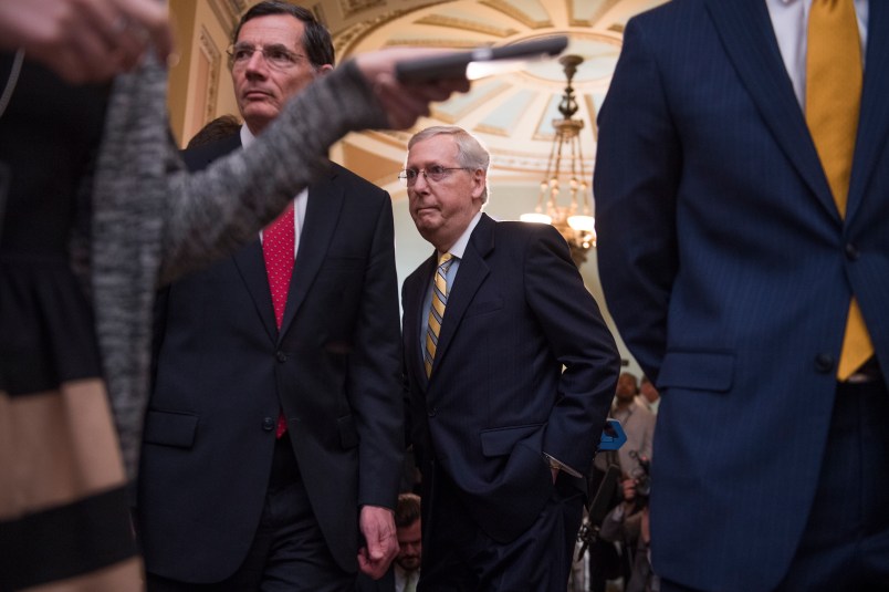 UNITED STATES - JUNE 13: Senate Majority Leader Mitch McConnell, R-Ky., center, and Sen. John Barrasso, R-Wyo., conclude a news conference after the Senate Policy luncheons in the Captiol on June 13, 2017. (Photo By Tom Williams/CQ Roll Call)