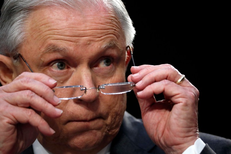 Attorney General Jeff Sessions removes his glasses as he speaks on Capitol Hill in Washington, Tuesday, June 13, 2017, while testifying before the Senate Intelligence Committee hearing about his role in the firing of James Comey, his Russian contacts during the campaign and his decision to recuse from an investigation into possible ties between Moscow and associates of President Donald Trump. (AP Photo/Alex Brandon)