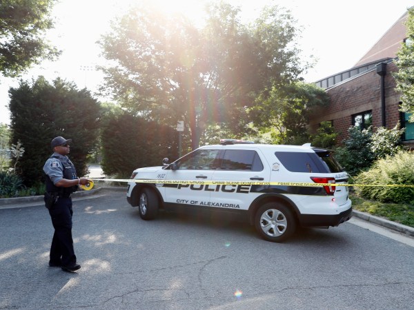 An Alexandria police officer tapes off an area near the YMCA after a shooting Wednesday, June 14, 2017, in Alexandria, Va. A top House Republican, Steve Scalise of Louisiana, was shot Wednesday at a congressional baseball practice. (AP Photo/Alex Brandon)