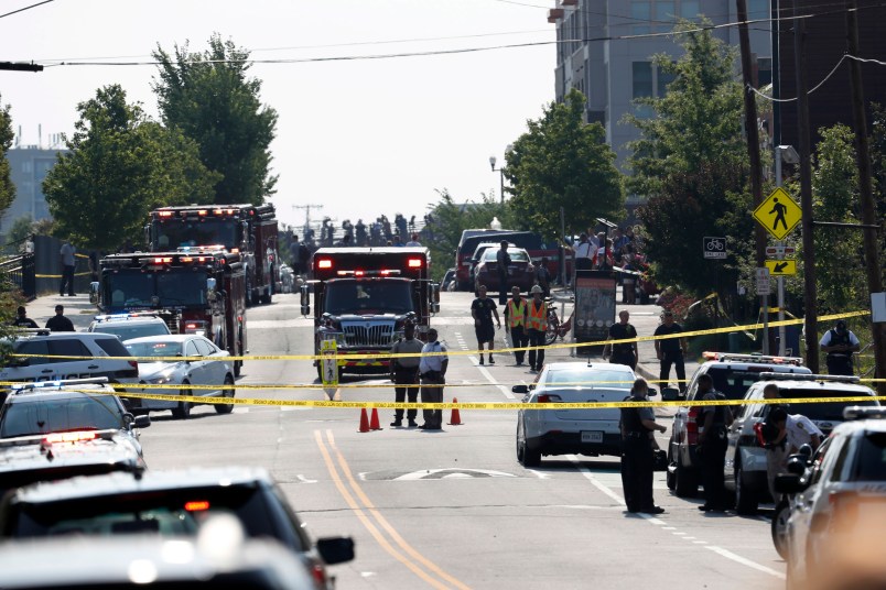 Alexandria Police and other first responders block East Monroe Ave. after a shooting Wednesday, June 14, 2017, in Alexandria, Va. A top House Republican, Steve Scalise of Louisiana, was shot Wednesday at a congressional baseball practice. (AP Photo/Alex Brandon)