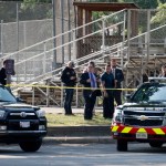 Law enforcement officers investigate the scene of a shooting near a baseball field Wednesday, June 14, 2017, in Alexandria, Va. A top House Republican, Steve Scalise of Louisiana, was shot Wednesday at a congressional baseball practice. (AP Photo/Alex Brandon)