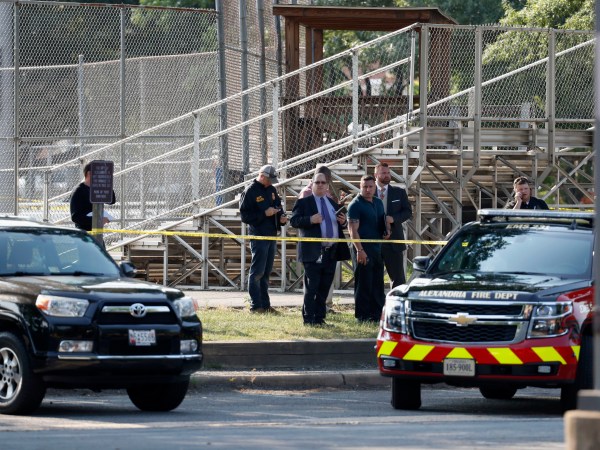 Law enforcement officers investigate the scene of a shooting near a baseball field Wednesday, June 14, 2017, in Alexandria, Va. A top House Republican, Steve Scalise of Louisiana, was shot Wednesday at a congressional baseball practice. (AP Photo/Alex Brandon)