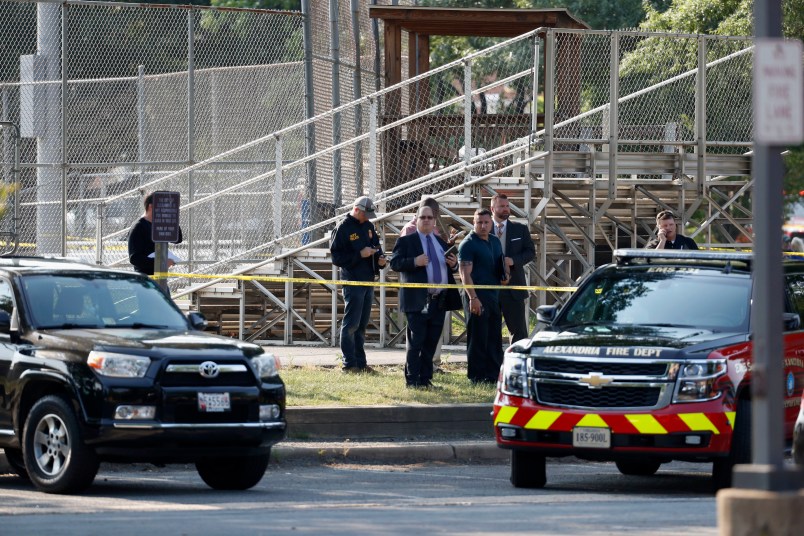 Law enforcement officers investigate the scene of a shooting near a baseball field Wednesday, June 14, 2017, in Alexandria, Va. A top House Republican, Steve Scalise of Louisiana, was shot Wednesday at a congressional baseball practice. (AP Photo/Alex Brandon)