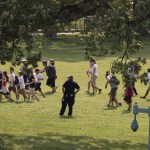 Tourists are directed away from the Capitol Building and across the lawn by U.S. Capitol Police officers after Rep. Steve Scalise, who is the majority whip, and a number of aides and officers were injured Wednesday morning in a shooting at a congressional baseball game in Alexandria, Va., in Washington, Wednesday, June 14, 2017. (AP Photo/J. Scott Applewhite)