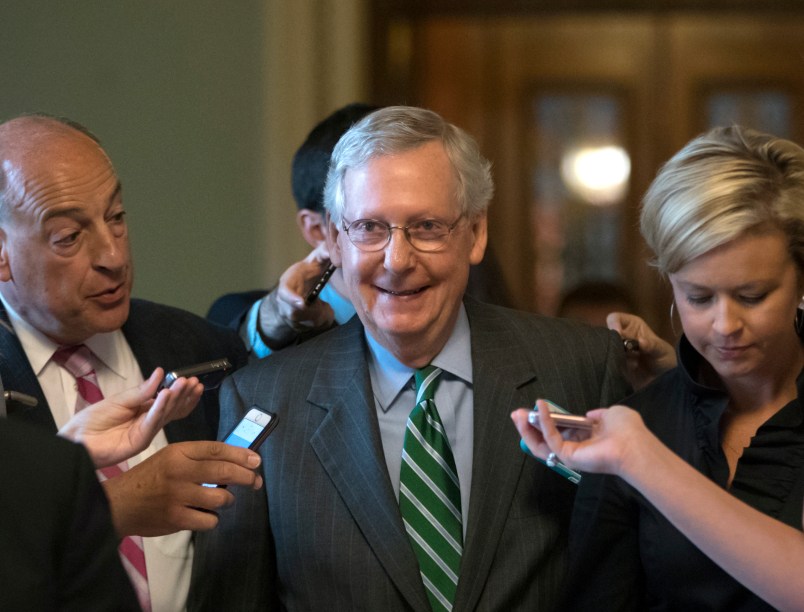 Senate Majority leader Mitch McConnell smiles as he leaves the chamber after announcing the release of the Republicans' healthcare bill which represents the party's long-awaited attempt to scuttle much of President Barack Obama's Affordable Care Act, at the Capitol in Washington, Thursday, June 22, 2017. The measure represents the Senate GOP's effort to achieve a top tier priority for President Donald Trump and virtually all Republican members of Congress.   (AP Photo/J. Scott Applewhite)
