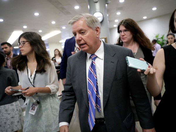 Sen. Lindsey Graham, R-S.C., chairman of the  Senate Judiciary Subcommittee on Crime and Terrorism, rushes to the floor for final votes of the week after Republicans released their long-awaited bill to scuttle much of President Barack Obama's Affordable Care Act, at the Capitol in Washington, Thursday, June 22, 2017.  (AP Photo/J. Scott Applewhite)