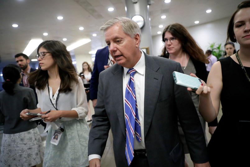 Sen. Lindsey Graham, R-S.C., chairman of the  Senate Judiciary Subcommittee on Crime and Terrorism, rushes to the floor for final votes of the week after Republicans released their long-awaited bill to scuttle much of President Barack Obama's Affordable Care Act, at the Capitol in Washington, Thursday, June 22, 2017.  (AP Photo/J. Scott Applewhite)