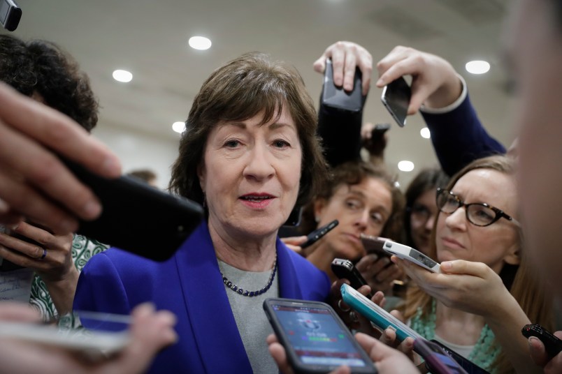 Sen. Susan Collins, R-Maine, speaks amid a crush of reporters after Republicans released their long-awaited bill to scuttle much of President Barack Obama's Affordable Care Act, at the Capitol in Washington, Thursday, June 22, 2017. She is one of four GOP senators to say they are opposed to it as written which could put the measure in immediate jeopardy.  (AP Photo/J. Scott Applewhite)