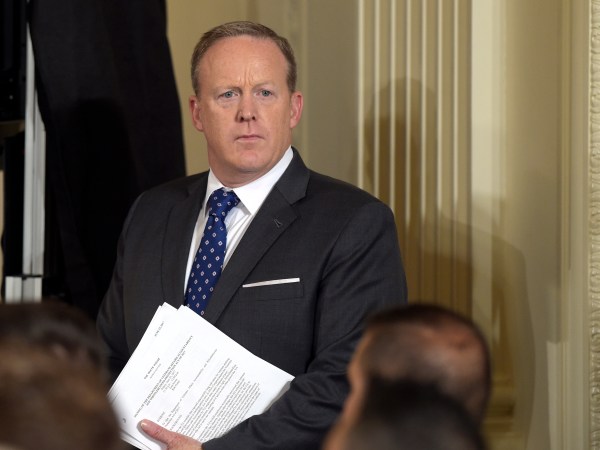 White House press secretary Sean Spicer waits for the start of a bill signing event for the "Department of Veterans Affairs Accountability and Whistleblower Protection Act of 2017," in the East Room of the White House in Washington, Friday, June 23, 2017. (AP Photo/Susan Walsh)