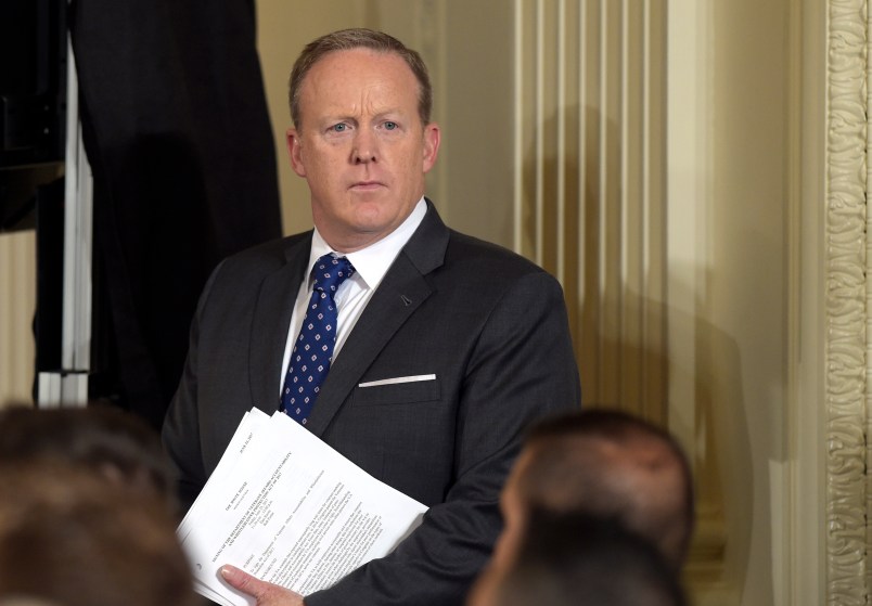 White House press secretary Sean Spicer waits for the start of a bill signing event for the "Department of Veterans Affairs Accountability and Whistleblower Protection Act of 2017," in the East Room of the White House in Washington, Friday, June 23, 2017. (AP Photo/Susan Walsh)