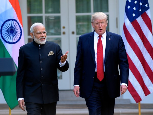 President Donald Trump and Indian Prime Minister Narendra Modi, step into the Rose Garden to make joint statements at the White House in Washington, Monday, June 26, 2017. (AP Photo/Susan Walsh)