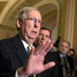 Senate Majority Leader Mitch McConnell, R-Ky., joined by Sen. John Barrasso, R-Wyo., right, tells reporters he is delaying a vote on the Republican health care bill while the GOP leadership works toward getting enough votes, at the Capitol in Washington, Tuesday, June 27, 2017. In a bruising setback, Senate Republican leaders are delaying a vote on their prized health care bill until after the July 4 recess, forced to retreat by a GOP rebellion that left them lacking enough votes to even begin debating the legislation, two sources said Tuesday. (AP Photo/J. Scott Applewhite)