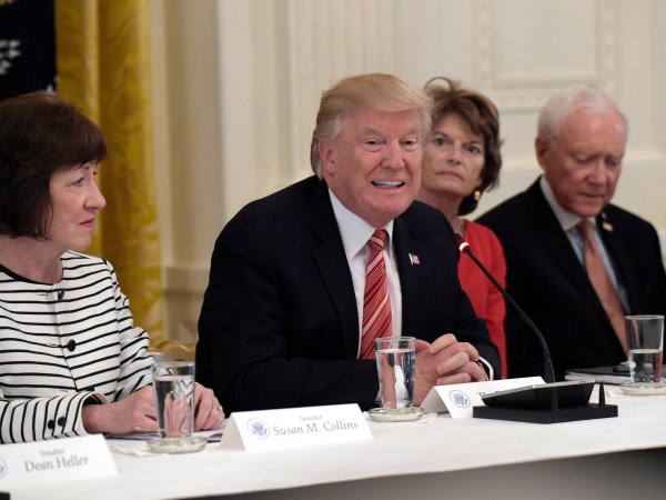 President Donald Trump, center, speaks as he meets with Republican senators on health care in the East Room of at the White House in Washington, Tuesday, June 27, 2017. Seated with him, from left, are Sen. Susan Collins, R-Maine, Sen. Lisa Murkowski, R-Alaska, and Sen. Orrin Hatch, R-Utah. (AP Photo/Susan Walsh)