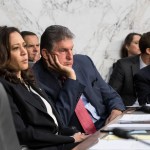 Senate Intelligence Committee members, from left, Sen. Kamala Harris, D-Calif., Sen. Joe Manchin, D-W.Va., and Sen. Angus King, D-Maine, listen to testimony from Director of National Intelligence Dan Coats and other security chiefs about gathering intelligence on foreign agents, on Capitol Hill in Washington, Wednesday, June 7, 2017. (AP Photo/J. Scott Applewhite)