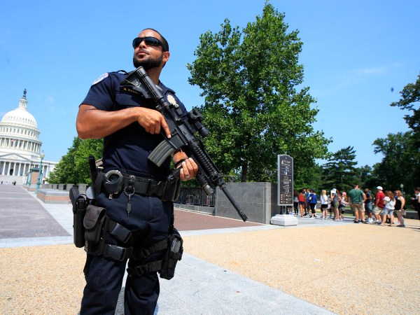 U.S. Capitol Police officer Nathan Rainey, stands guard outside the U.S. Capitol, in Washington, Wednesday, June 14, 2017, after House Majority Whip Steve Scalise of La. was shot during a congressional baseball practice. (AP Photo/Manuel Balce Ceneta)