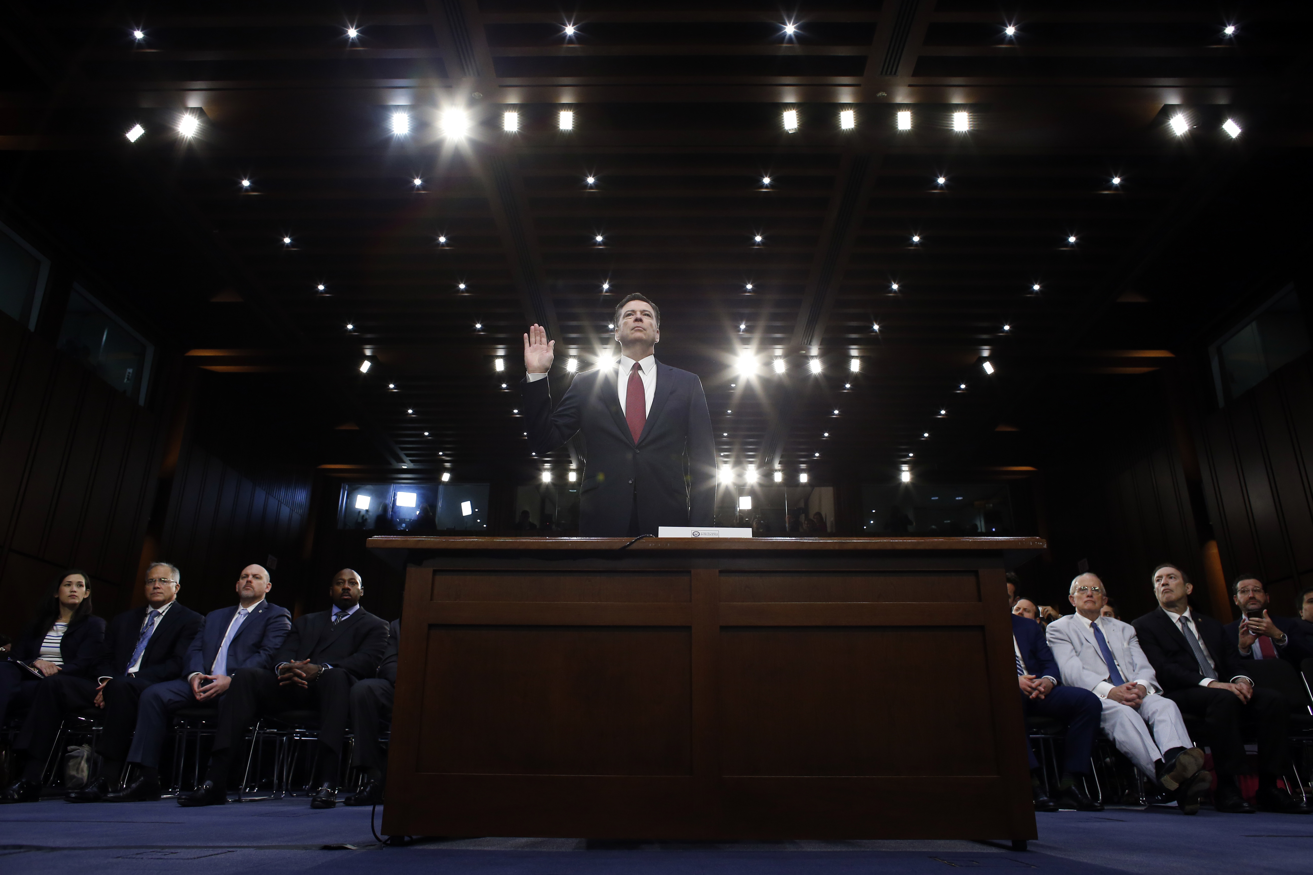 Former FBI Director James Comey is sworn in during a Senate Intelligence Committee hearing on Capitol Hill, Thursday, June 8, 2017, in Washington. (AP Photo/Alex Brandon)