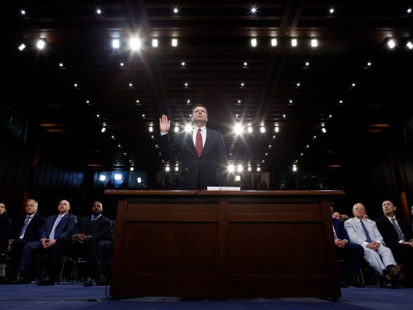 Former FBI Director James Comey is sworn in during a Senate Intelligence Committee hearing on Capitol Hill, Thursday, June 8, 2017, in Washington. (AP Photo/Alex Brandon)
