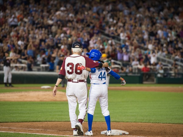 UNITED STATES - JUNE 15: Rep. Nanette Barragan, D-Calif., and Bill Pascrell, D-N.J., celebrate her hit during the 56th Congressional Baseball Game at Nationals Park on June 15, 2017. (Photo By Tom Williams/CQ Roll Call)
