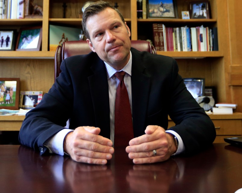 Secretary of State Kris Kobach talks with a reporter in his office in Topeka, Kan., Wednesday, May 17, 2017. (AP Photo/Orlin Wagner)