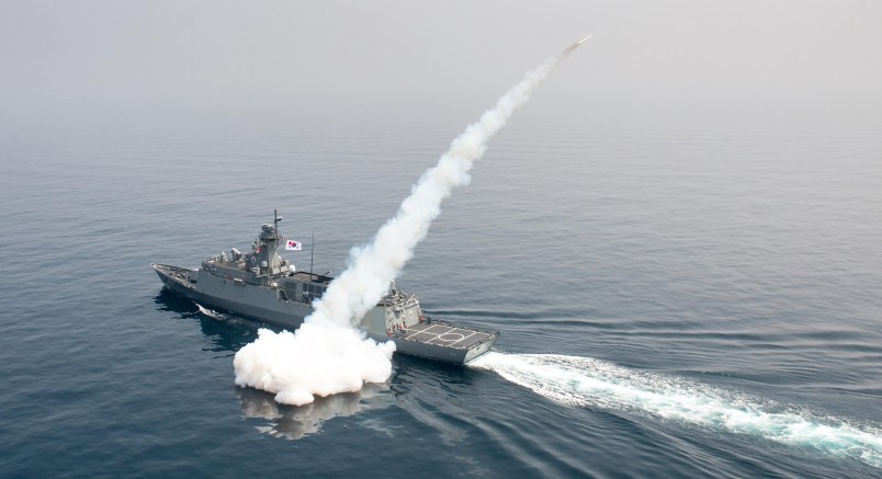 In this photo provided by South Korea Defense Ministry, a South Korean navy convoy fires a missile during a drill in South Korea's East Sea, Thursday, July 6, 2017. South Korean warplanes and navy ships have fired a barrage of missiles into the waters during one-day drills aimed at boosting a readiness against a possible North Korean aggression. (South Korea Defense Ministry via AP)