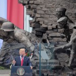 U.S. President Donald Trump delivers a speech in Krasinski Square, back dropped by the monument commemorating the 1944 Warsaw Uprising against the Nazis, in Warsaw, Poland, Thursday, July 6, 2017. (AP Photo/Alik Keplicz)